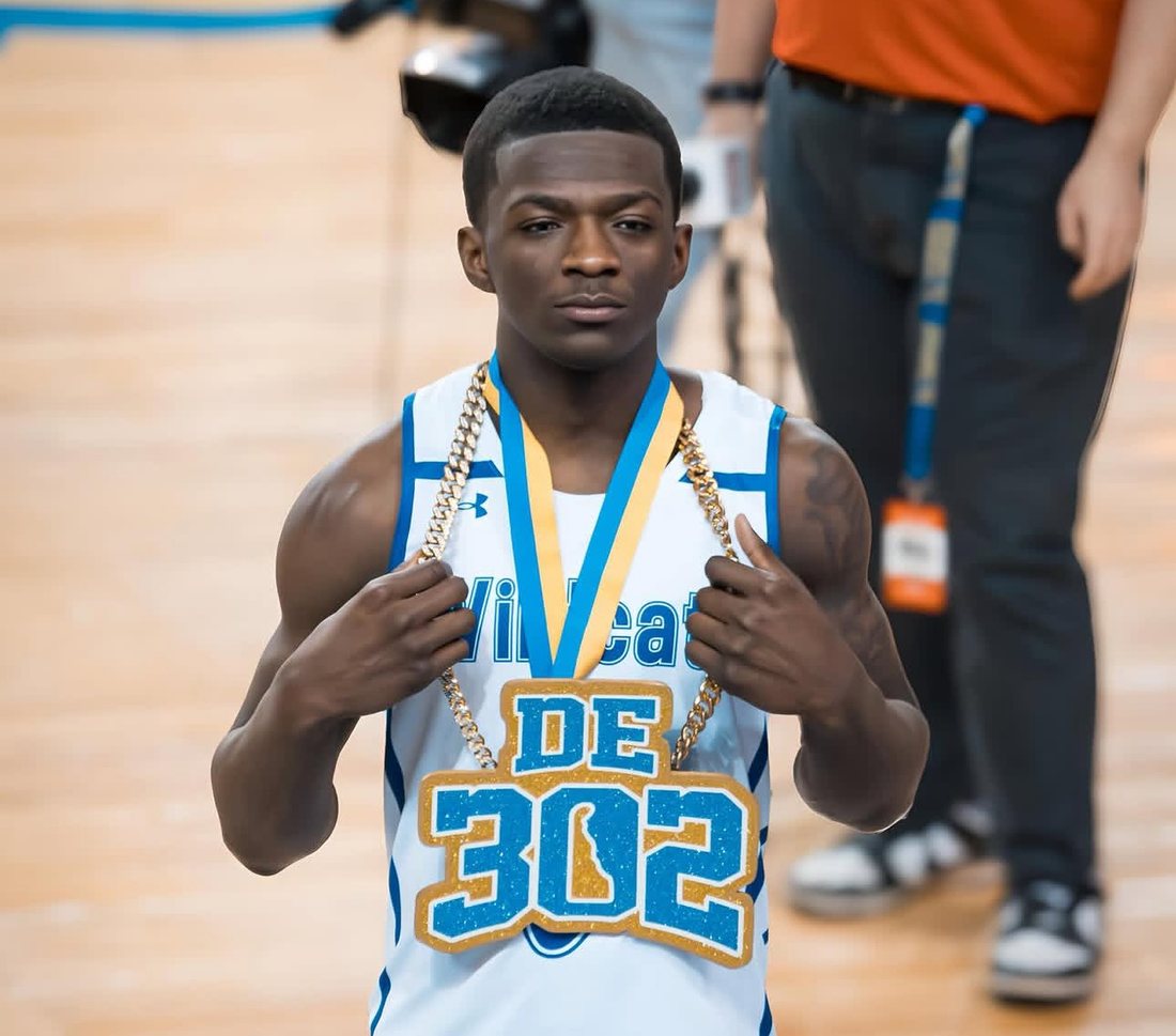 Nick with the chain after the title